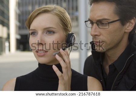 Two business people standing together. - Stock Image - Everypixel