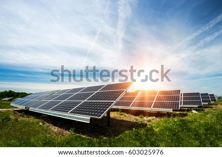 Similar – Foto Bild Erzeugung von Solarstrom. Photovoltaikanlage auf dem Lande. Bewölkter Himmel, Spanien