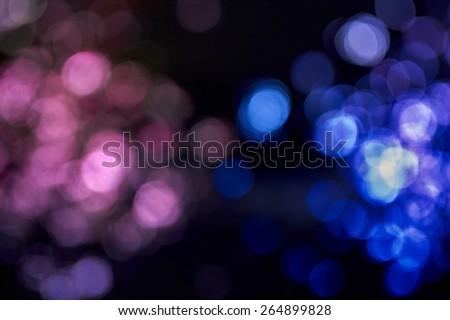 Beautiful pink and blue blurred  lights on dark background