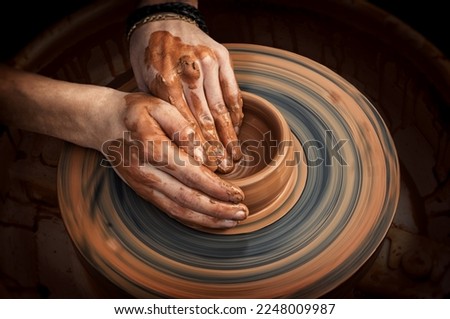 Image, Stock Photo Ceramist hands make a plate of clay