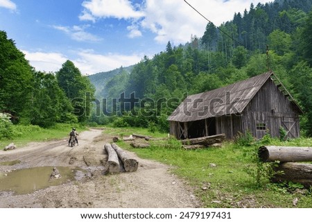 Similar – Foto Bild Motorrad und Baumstämme in der Wüste