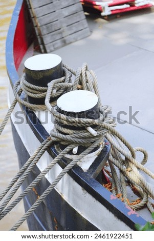 Similar – Image, Stock Photo Coil of used mooring ropes.