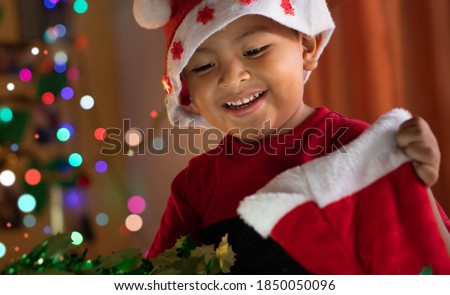 Similar – Image, Stock Photo Latin boy with Down syndrome cooking salad together