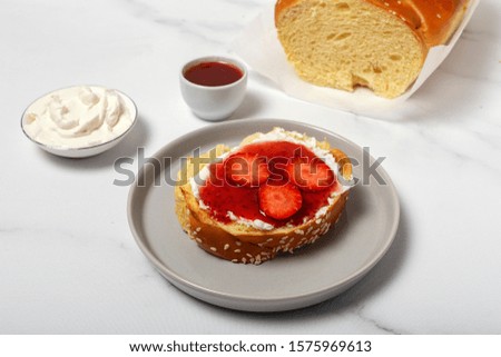 Similar – Foto Bild Frische Erdbeerbrioche auf einem Marmortisch im Entstehen