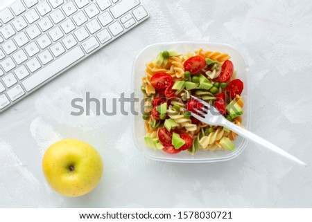 Similar – Image, Stock Photo Green pasta in plastic packing on dark kitchen table with kale and other ingredients. Top view