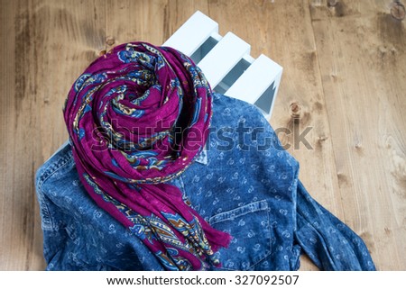 Set of clothes and various accessories for men on old wooden table