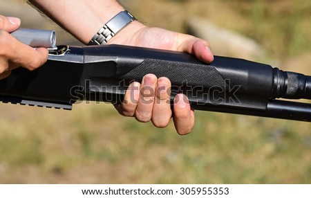 Loading a gun with cartridges