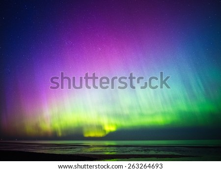 Beautiful Aurora Borealis over sea 