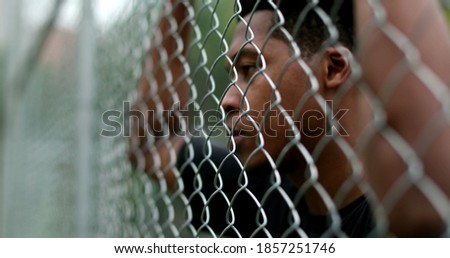 Similar – Image, Stock Photo Pensive millennial ethnic athlete relaxing after training on wooden stairs in park