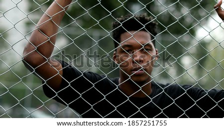 Similar – Image, Stock Photo Pensive millennial ethnic athlete relaxing after training on wooden stairs in park