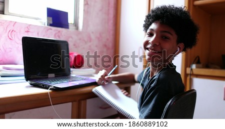 Image, Stock Photo Tired kid browsing laptop at home