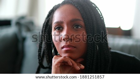 Similar – Image, Stock Photo Pensive black woman on urban pavement in daytime