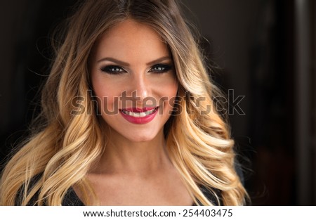 Young attractive blond hair woman portrait.Not retouched.Natural light.