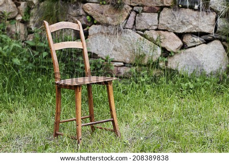 Chair in front of boundary wall