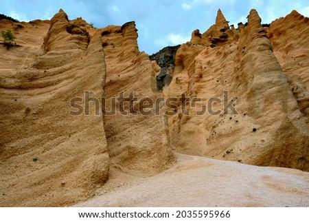 Lame rosse near Fiastra Lake in Marche in Italy. Amazing red rocks sharped like knife due to erosion caused by weathering fairy place. Martian landscape. The italian arizona monument valley Foto d'archivio © 