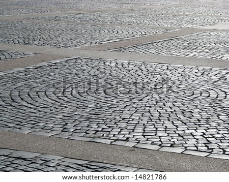 The cobblestone road on the Palace square of St.-Petersburg (Russia) has very beautiful structure.