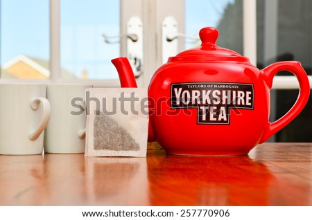 LEEDS - MARCH 04 : Yorkshire Tea teapot teabags and teacups, 2015 in Leeds, UK.