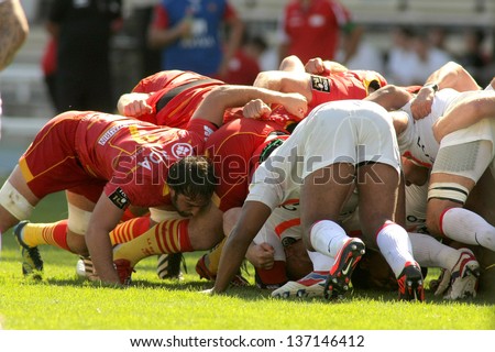 BARCELONA - SEPT, 15: USAP Perpignan players scrumming during the French rugby union league match USAP Perpignan vs Stade Toulousain at the Olympic Stadium in Barcelona, on September 15, 2012