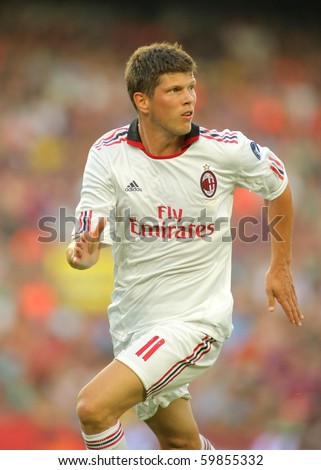 BARCELONA - AUGUST 25: Huntelaar of AC Milan in action during Trophy Joan Gamper match between FC Barcelona and AC Milan at Nou Camp Stadium on August 25, 2010 in Barcelona, Spain.