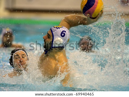 BARCELONA - JAN 19: Marc Minguell of Atletic Barceloneta during a waterpolo euroleague match between Barceloneta and Primorje Rijeka at the Nova Escullera pool on January 19, 2011 in Barcelona, Spain
