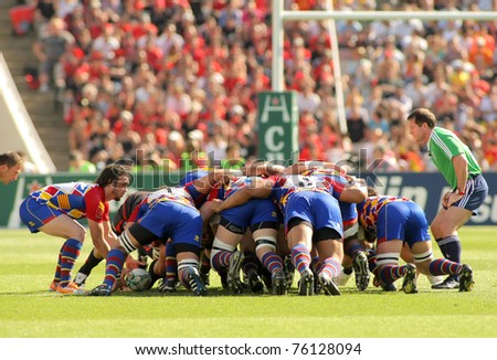 BARCELONA - APRIL 9: USAP Perpignan players scrumming during the Heineken European Cup quarter-final match USAP Perpignan against RC Toulon on April 9, 2011 at the Olympic Stadium in Barcelona, Spain.
