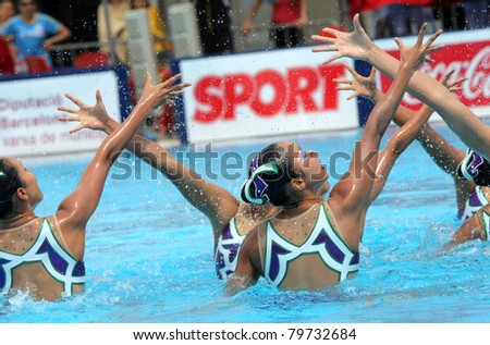 BARCELONA - JUNE 19: Japanese synchro swimmers in a Team exercise during the Espana Sincro meeting in Barcelona Picornell Swimpool, June 19, 2011 in Barcelona, Spain