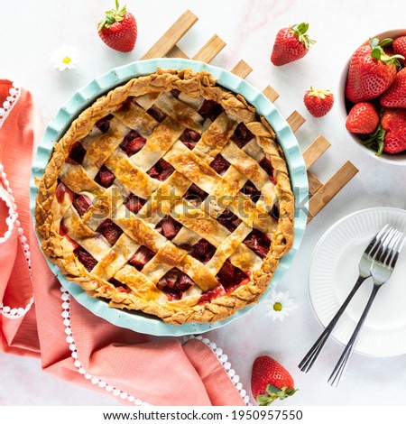 Similar – Image, Stock Photo Strawberry and rhubarb pie with a lattice crust. Fruits dessert