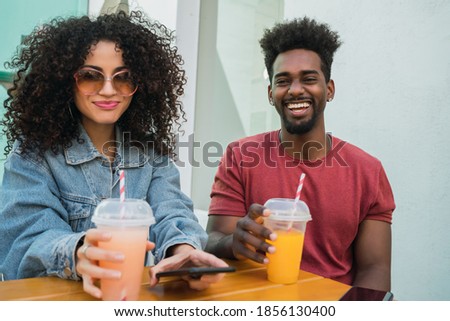 Two afro friends having fun together.
