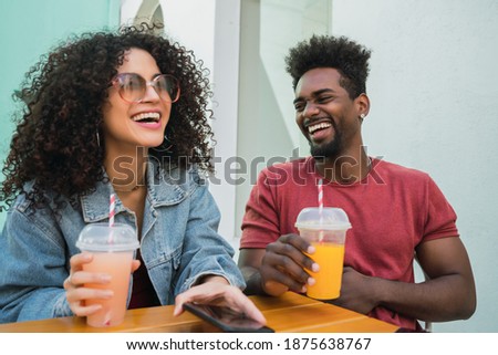 Two afro friends having fun together.