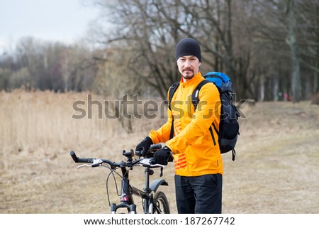 Healthy lifestyle, young man biking