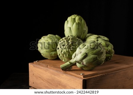 Similar – Image, Stock Photo Boxes with artichokes on farm