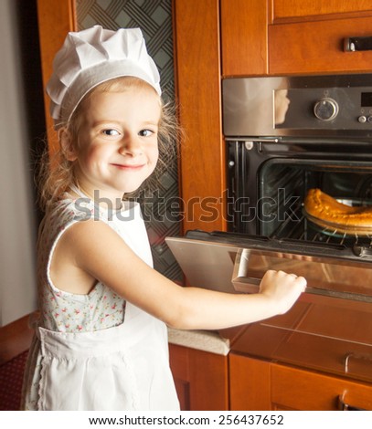 little girl cook at home