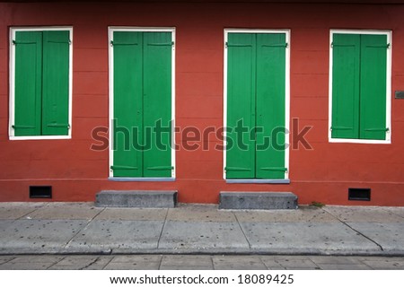 Two doors and two windows of a house in New Orleans, Louisiana, USA