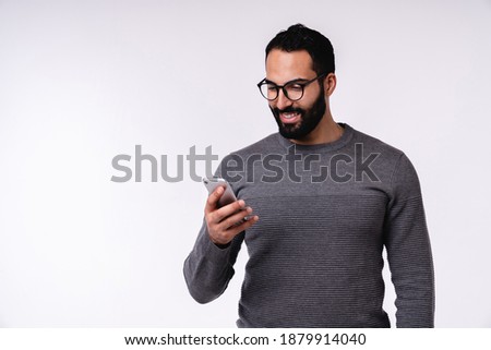 Similar – Image, Stock Photo Islamic man using smartphone on street