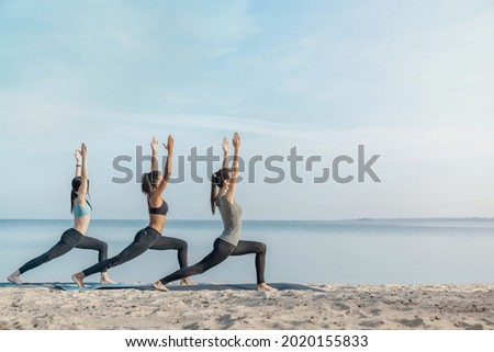 Similar – Image, Stock Photo Woman practicing pilates pose Cobra in park on summer