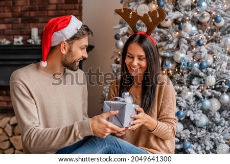 Similar – Image, Stock Photo Laughing girlfriends sitting on washing machine in house