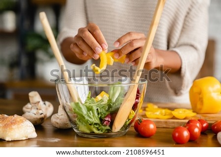 Similar – Image, Stock Photo Crop woman cutting mushroom over bowl