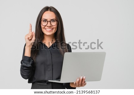Smart caucasian young confident businesswoman ceo manager bank employee worker boss having idea startup holding laptop for remote work, watching webinars online, multitasking isolated in white Photo stock © 