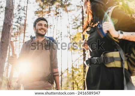 Similar – Image, Stock Photo Looking through the woods to a boat on a lake in the mountains with still reflection