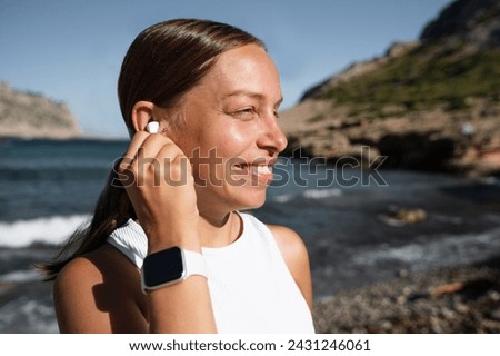 Similar – Image, Stock Photo Sportswoman on shore with paddle board