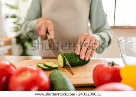 Similar – Image, Stock Photo Senior woman preparing mushrooms