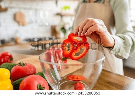 Similar – Image, Stock Photo Crop woman cutting mushroom over bowl