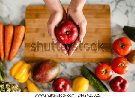 Similar – Image, Stock Photo Female hand with radish in hand in a fruit shop