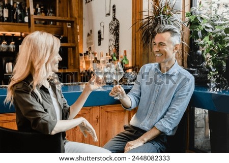 Similar – Image, Stock Photo Happy couple colleagues hugging on the street