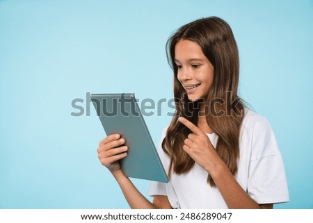 Similar – Image, Stock Photo Cheerful woman reading notebook in office