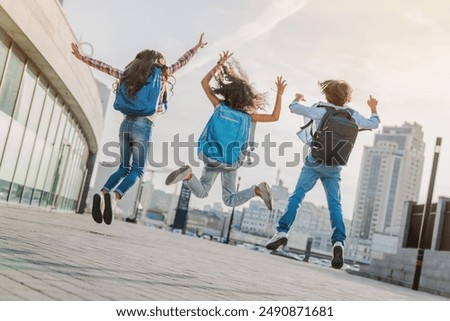 Similar – Image, Stock Photo Cheerful child having fun while playing video game at home