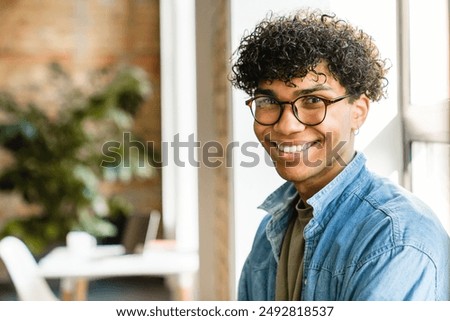 Similar – Image, Stock Photo Young black man enjoying music in headphones