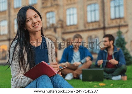 Similar – Image, Stock Photo Two university student friends embracing each other happy after meeting again at campus after holiday. Hug lovely concept. Study and learn together concept. Back to school and class.