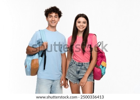 Similar – Image, Stock Photo The girl with the beautiful red bathing cap and the green swimsuit looks through heart-shaped sunglasses directly into the camera. A summer love.