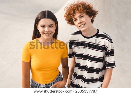 Similar – Image, Stock Photo Hipster teenage couple bonding on field in sunlight